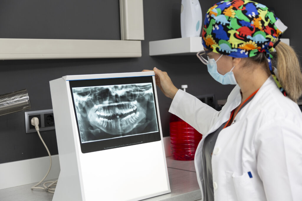 Orthodontist reviewing results from the 3D Digital Scanner