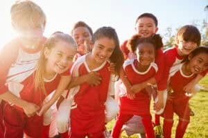 kids playing sports with braces